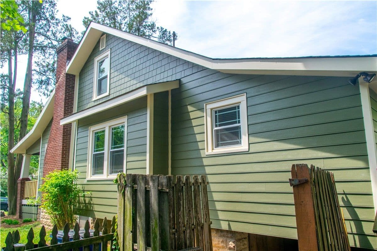 green siding on home