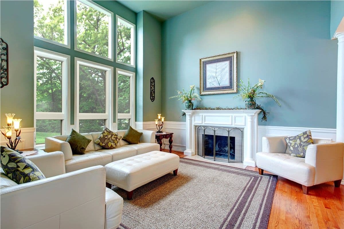 living room with tall windows