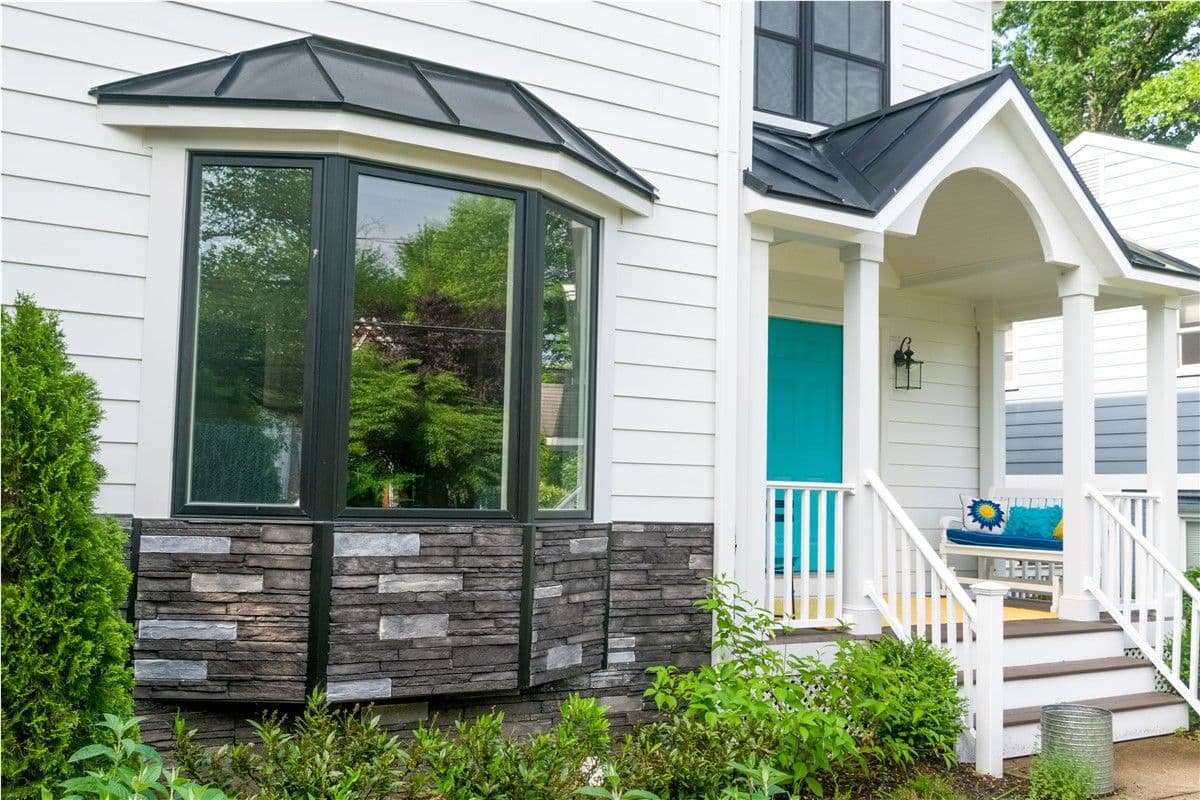 vinyl window front of home
